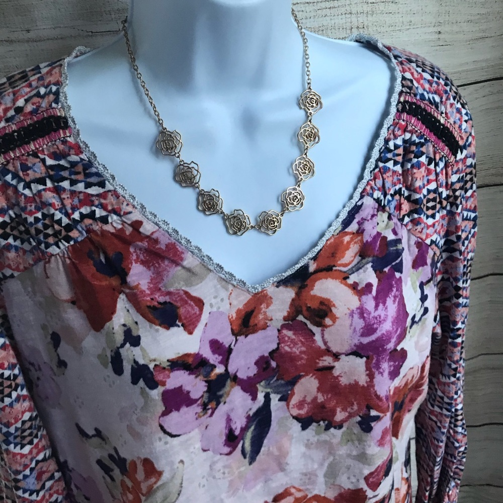 3/4 length sleeve floral light weight shirt.